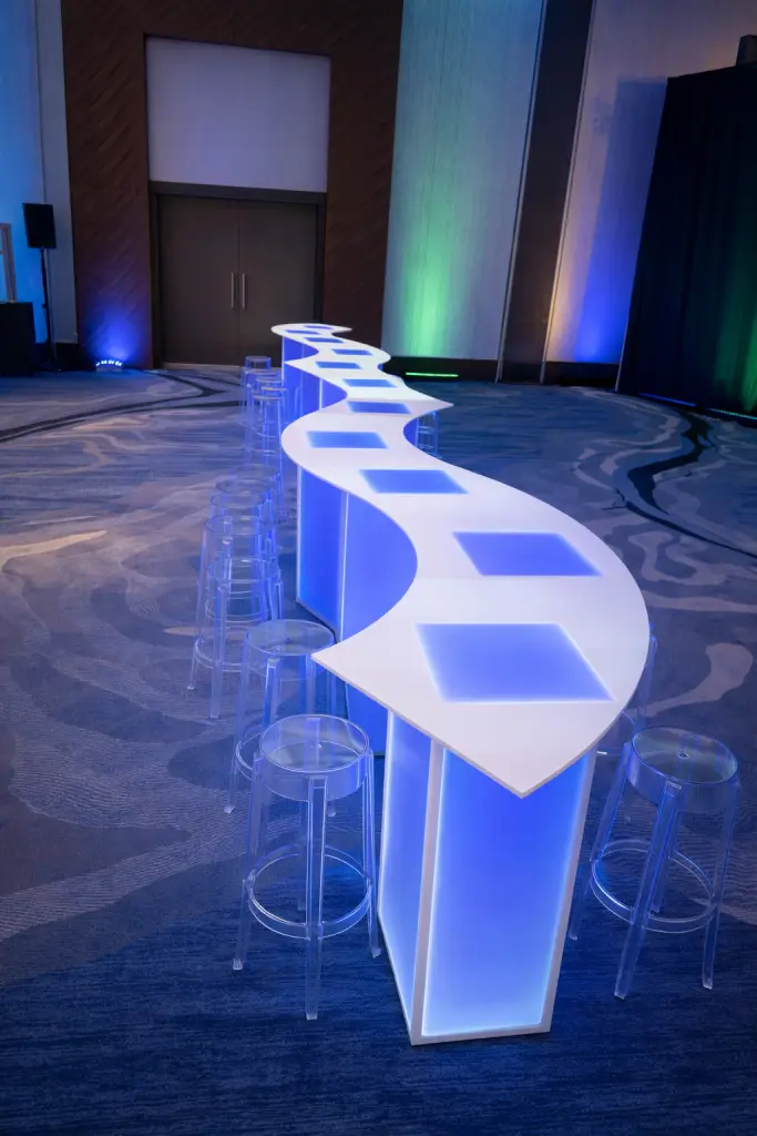 Serpentine LED table rental for trade show